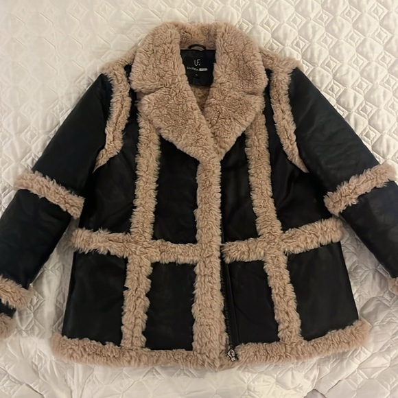 Faux black leather jacket
Seems more like a large. - Picture 2 of 7